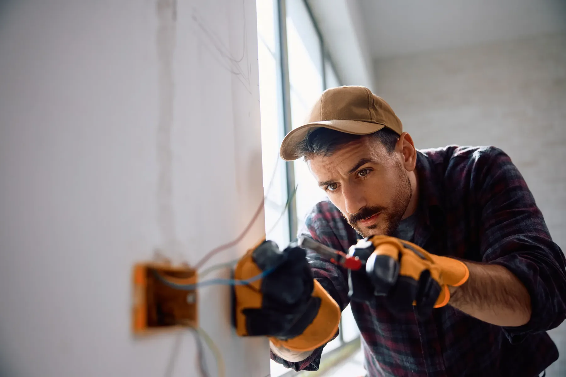 Electrical wiring installation in a building under construction.