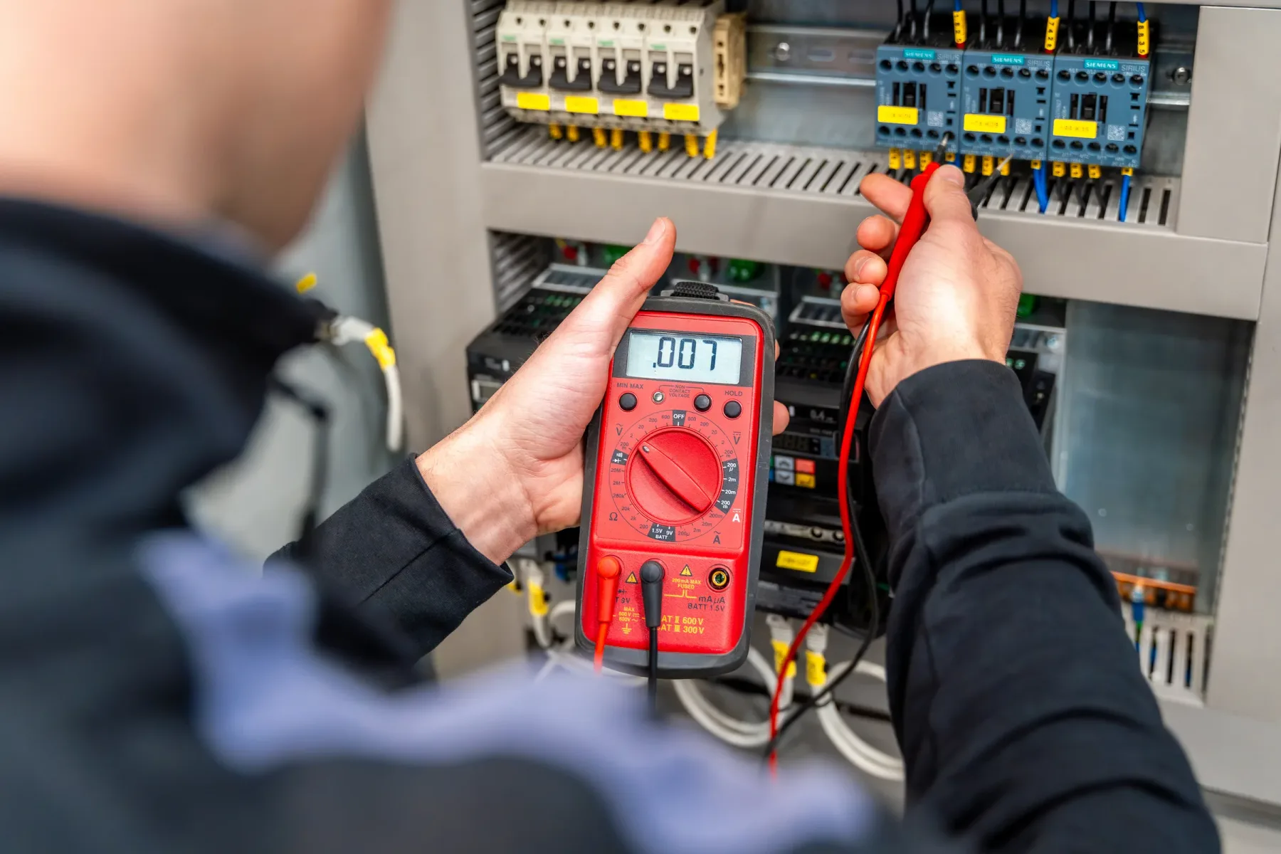 Electrical troubleshooting with a digital multimeter.